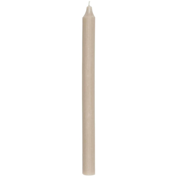 A tall beige dinner candle.