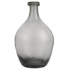 A grey glass teardrop shaped vase.