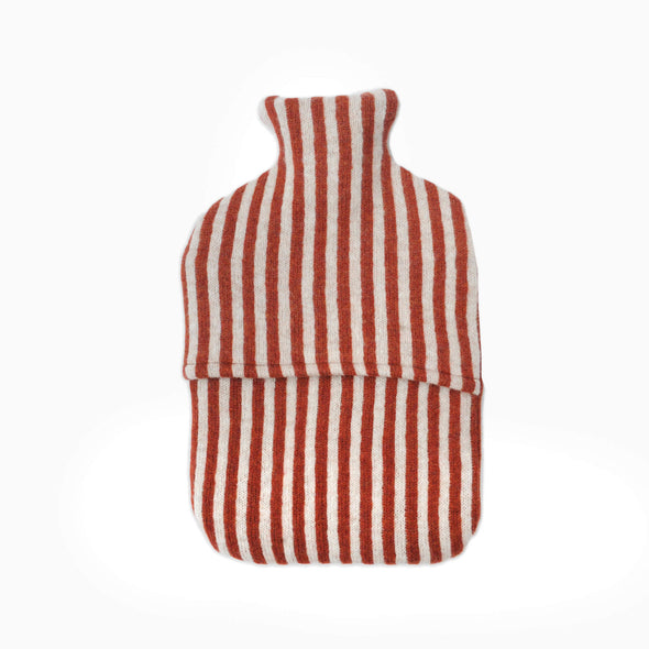 Knitted lambswool hot water bottle with vertical stripes in red and white. Height thirty four centimetres, width twenty centimetres.
