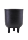 Black aluminium planter with three short legs. The planter is 18cm tall and 15cm wide.