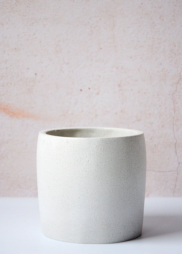  Light grey concrete planter, handmade by Salt Studios. Twelve centimetres tall and twelve centimetres wide.