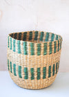 Seagrass basket with green stripes. Height thirty one centimetres, width thirty three centimetres.