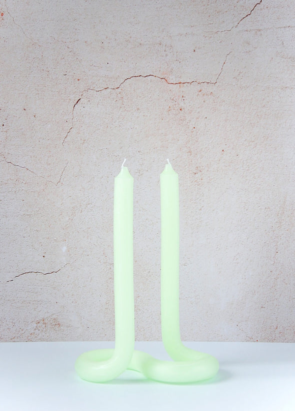 Handmade candle by Dutch designer Lex Pott. Double ended twist candle in mint green made entirely from wax and formed in such a way it stands alone on a twisted s shape base. Height twenty four centimetres, width ten centimetres, length seventeen point five centimetres.