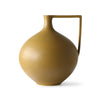 Round ceramic mustard coloured jar with an angular handle. Height is 26.5cm, width is 23cm and length is 26cm.