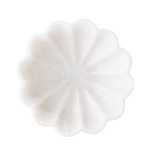 White marble fluted dish. Height four centimetres, width fifteen centimetres.